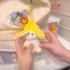 Wholesale of cute banana dog plush pendants, cartoon dolls, keychains, bags, pendants, children's and couple gifts details Picture
